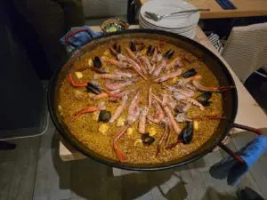 América Paella Dinner outdoor table setting at Ibiza marina