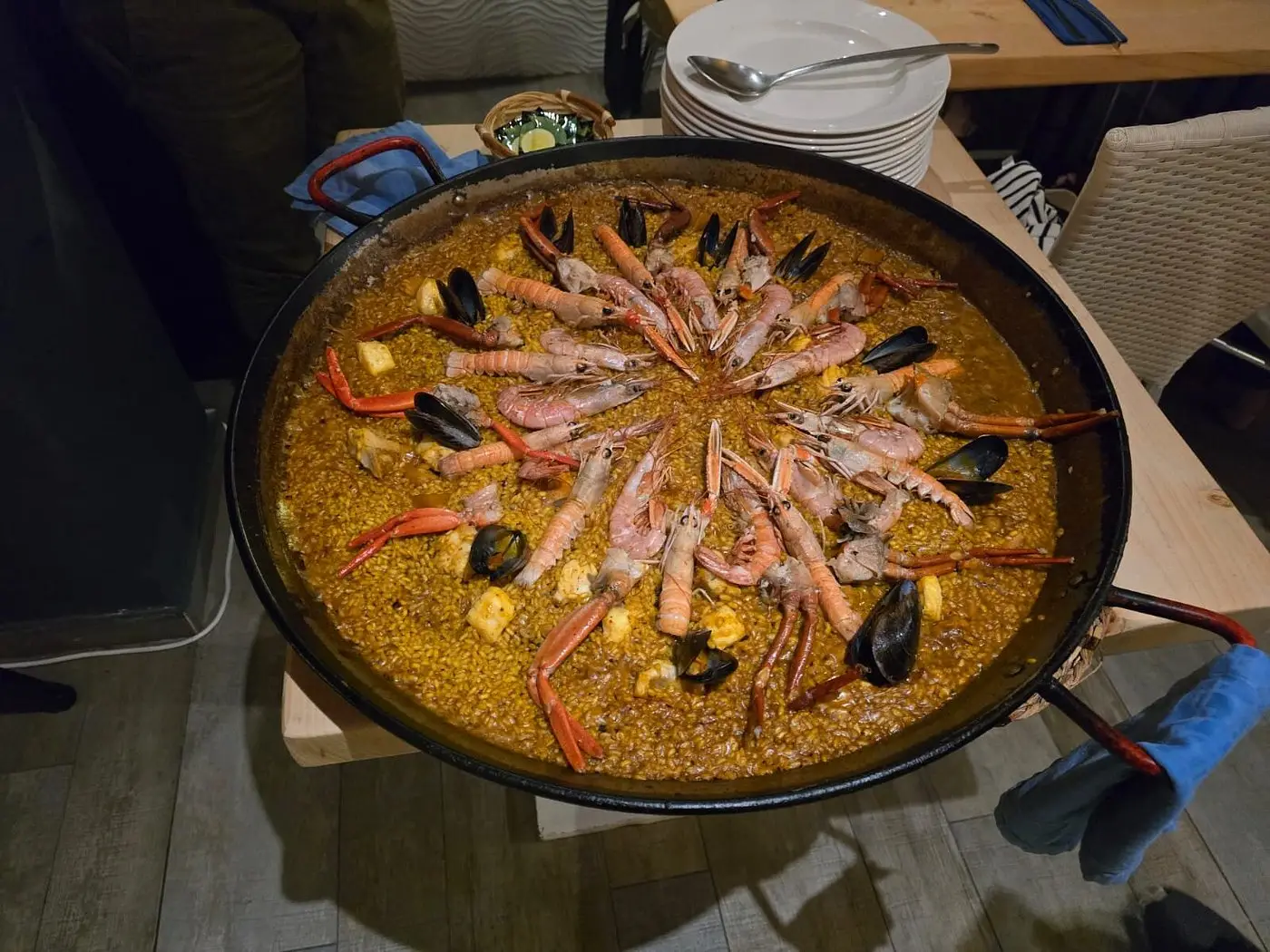 América Paella Dinner outdoor table setting at Ibiza marina