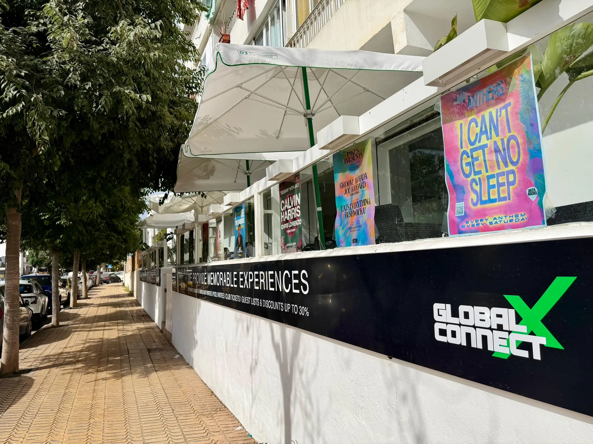 GXC Ibiza office with this week's Ibiza party flyers on display